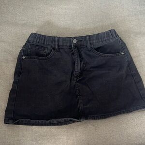 Black denim mini skirt
